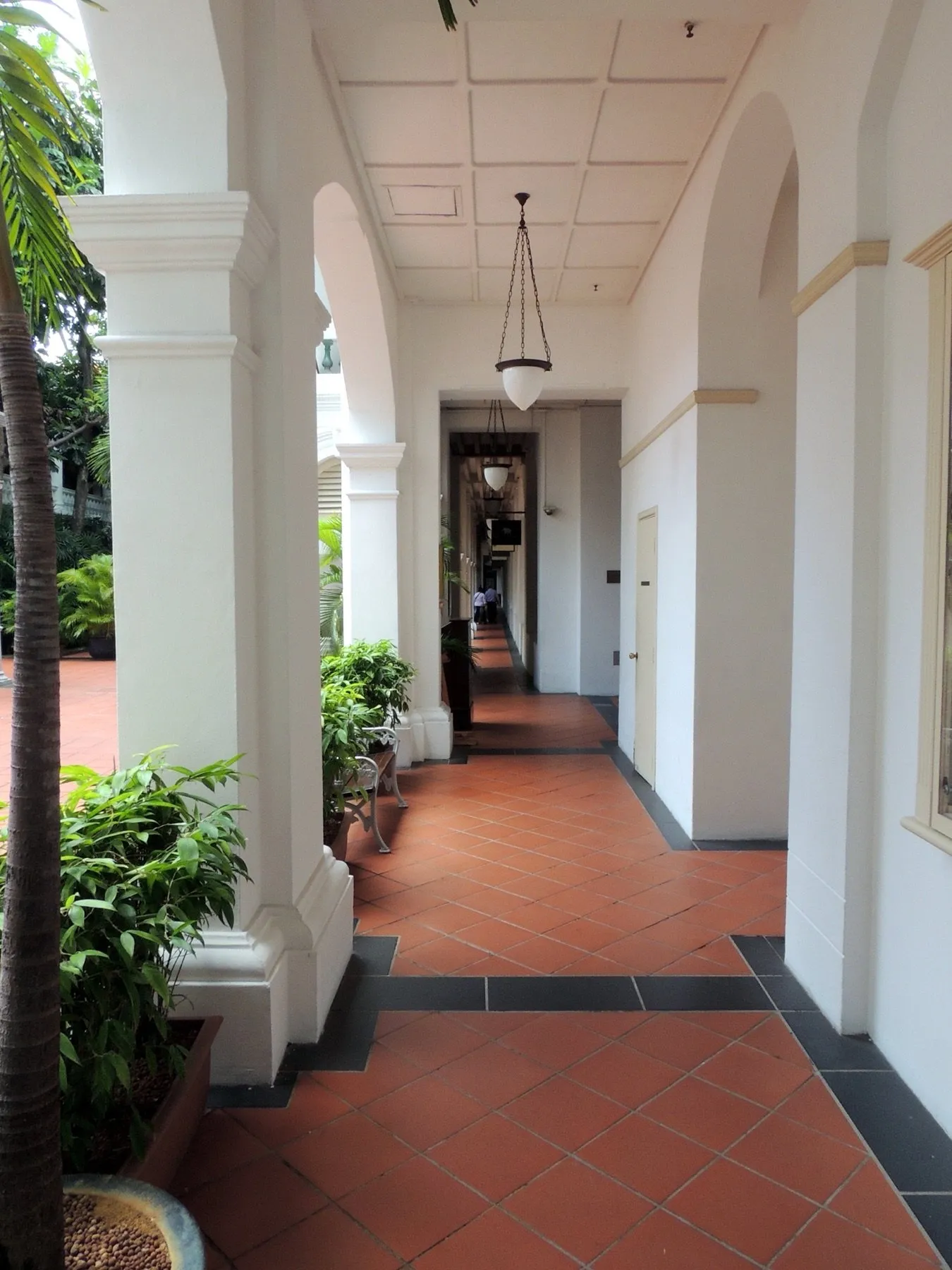 Arched walkway at Raffles Hotel in Singapore