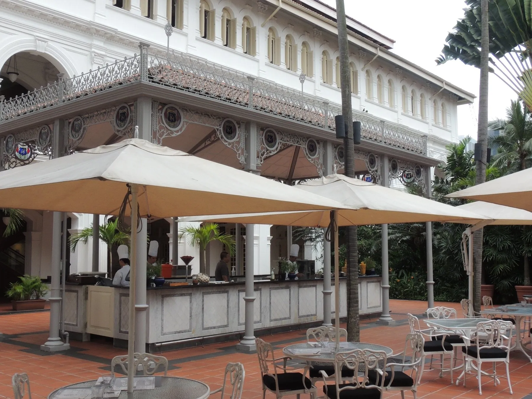 Raffles Hotel courtyard and umbrellas
