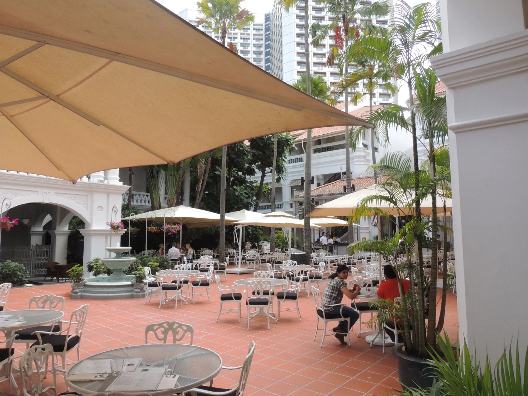 Wide view of the Raffles Hotel courtyard in Singapore