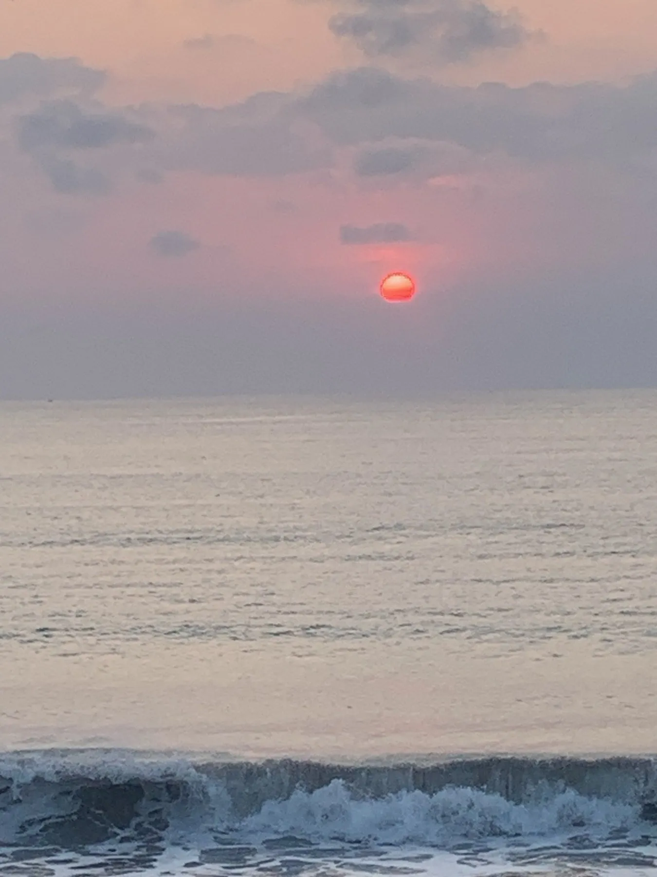 Soft sunrise over the water in Bali