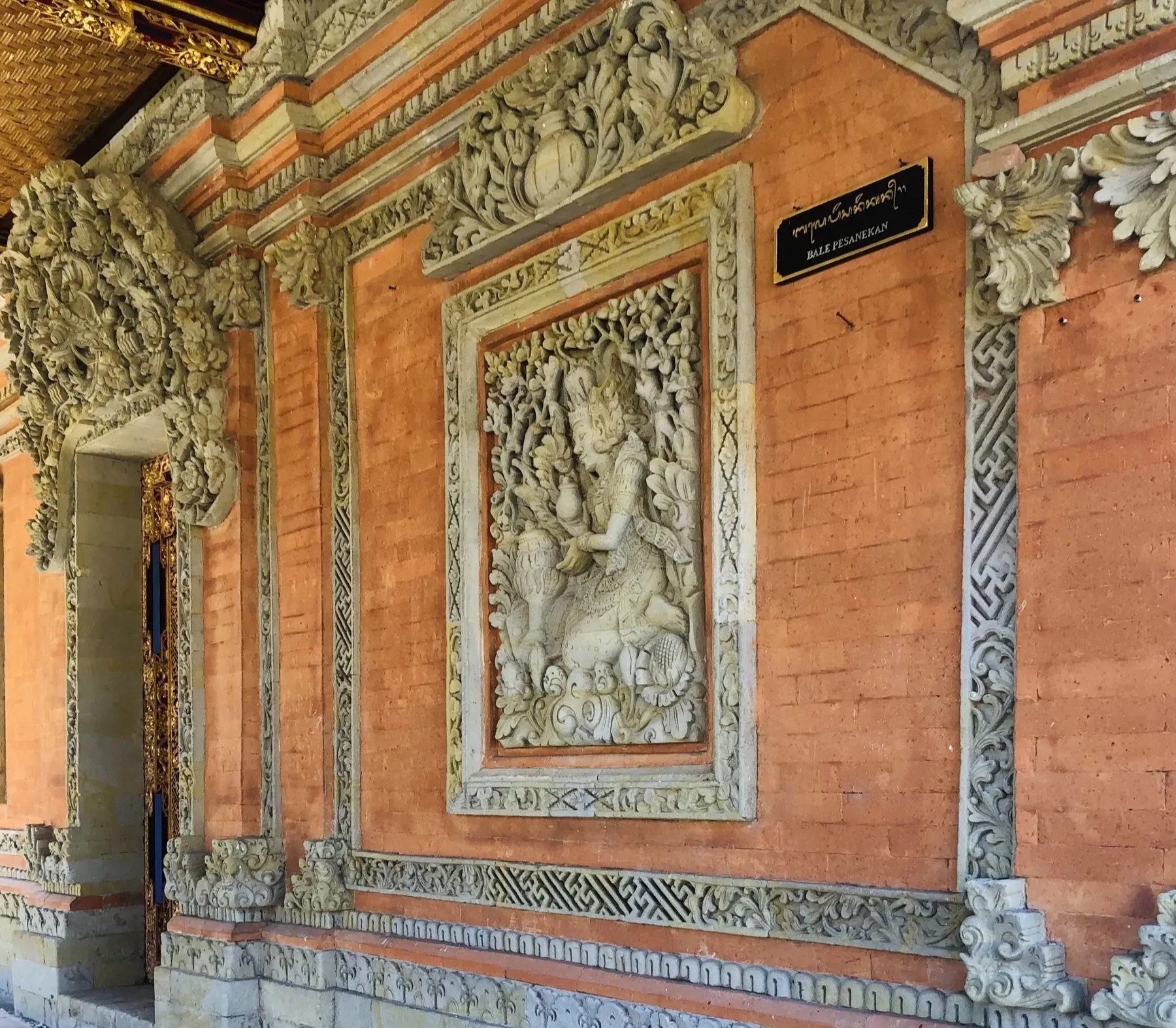 Detailed stone carving at a Balinese water temple